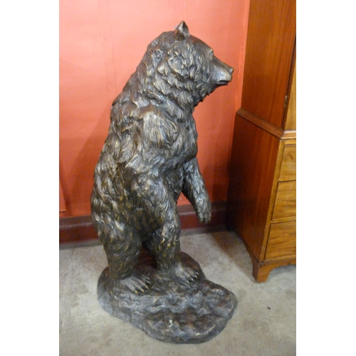 101 - A large bronze figure of a grizzly bear