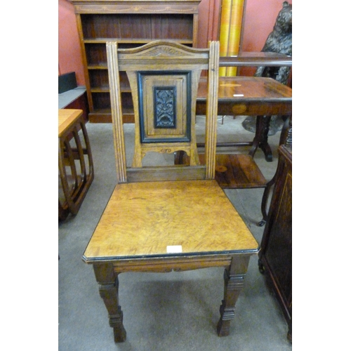 107 - A Victorian Aesthetic Movement pollard oak hall chair