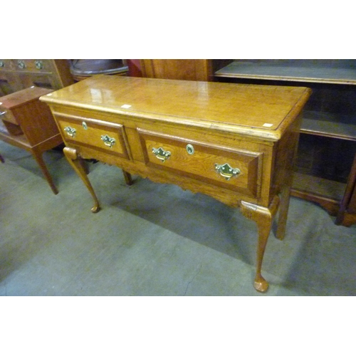 118 - A George II style oak dresser