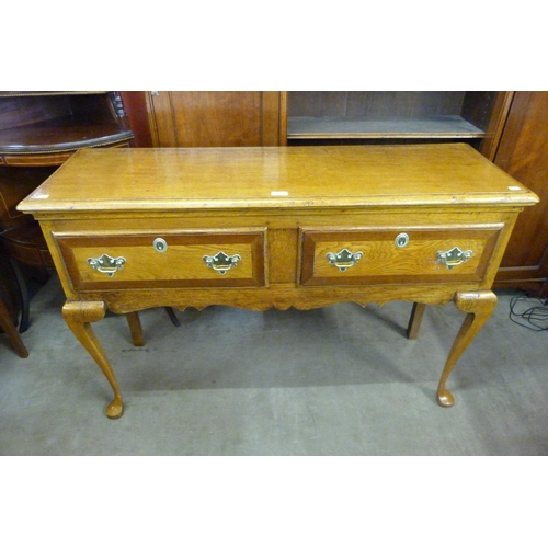 118 - A George II style oak dresser