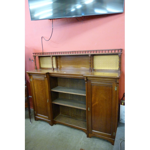 119 - A Victorian Aesthetic Movement walnut breakfront bookcase