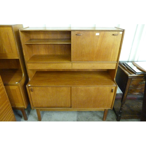 14 - A Nathan teak highboard