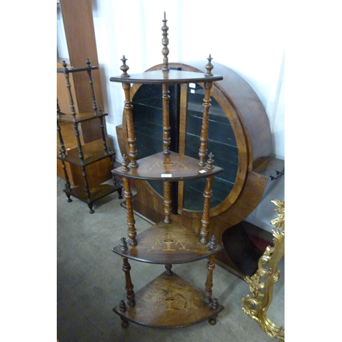 140 - A Victorian inlaid walnut four tier corner whatnot