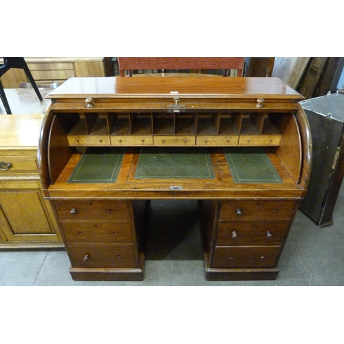 142 - A Victorian mahogany cylinder roll top desk