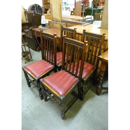 148 - A set of four oak barleytwist dining chairs