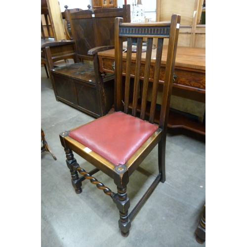 148 - A set of four oak barleytwist dining chairs