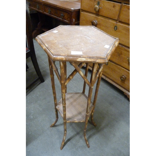 152 - A Victorian bamboo octagonal jardiniere stand