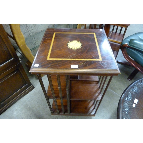 159 - A Regency style inlaid mahogany revolving bookcase