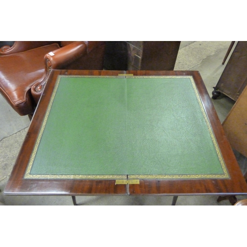 164 - An Edward VII inlaid walnut fold over writing table