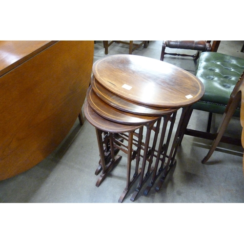 173 - An Edward VII inlaid mahogany nest of quartetto tables