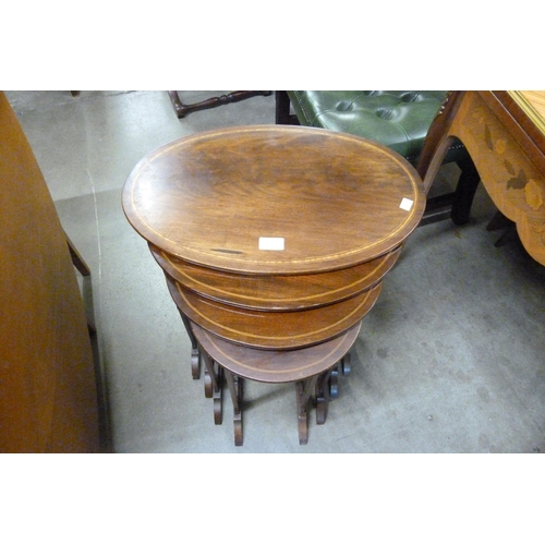 173 - An Edward VII inlaid mahogany nest of quartetto tables