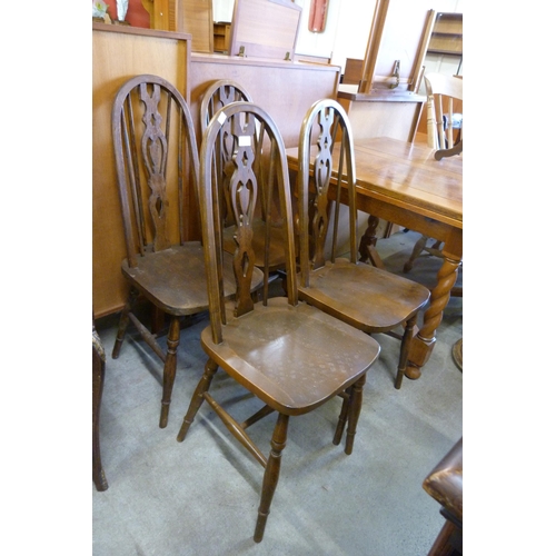 176 - A set of four beech kitchen chairs