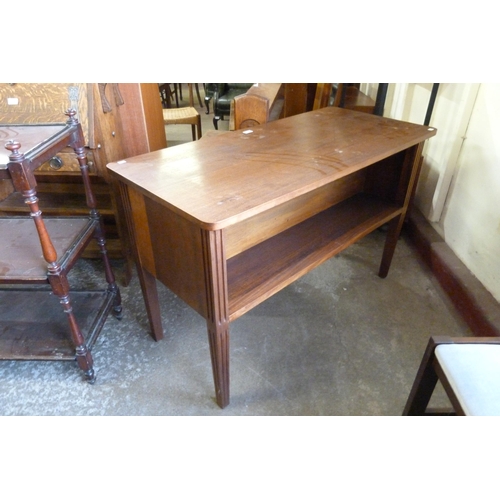 187 - A mahogany double sided open bookcase