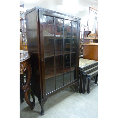 194 - An Edward VII mahogany single door bookcase