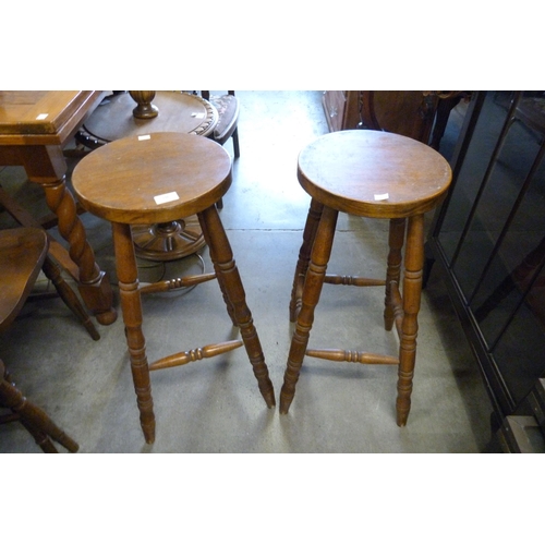 196 - A pair of Victorian style beech kitchen stools