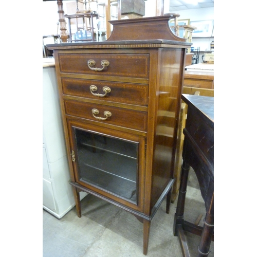 198 - An Edward VII inlaid mahogany single door music cabinet