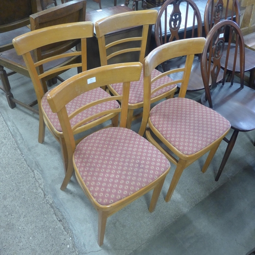 221 - A set of four beech kitchen chairs and a painted farmhouse armchair