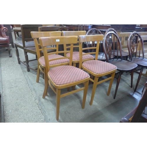 221 - A set of four beech kitchen chairs and a painted farmhouse armchair