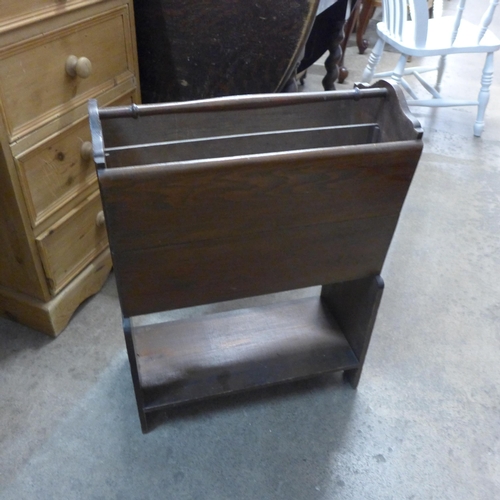 268 - An Art Deco beech chest of drawers, two magazine racks and a walnut piano stool