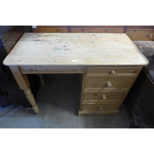 269 - An oak barleytwist gateleg table, a pine desk and a carved oak occasional table