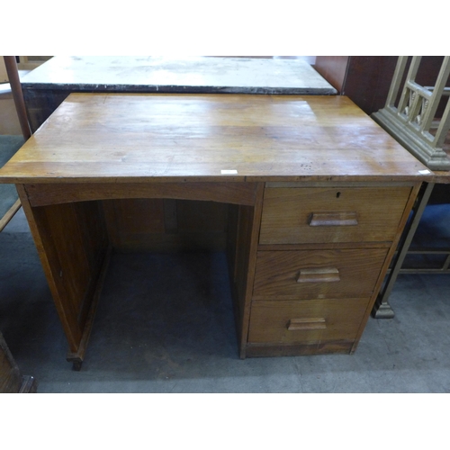 284 - An oak desk