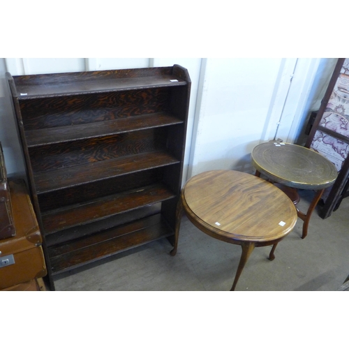 290 - A stained pine open bookcase, an Islamic brass topped coffee table and one other