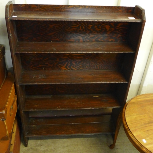 290 - A stained pine open bookcase, an Islamic brass topped coffee table and one other