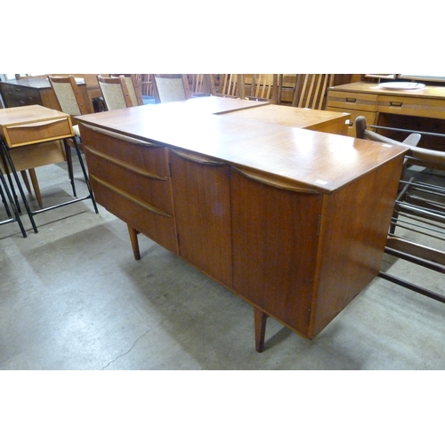 34 - A small teak sideboard