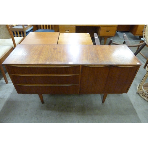 34 - A small teak sideboard