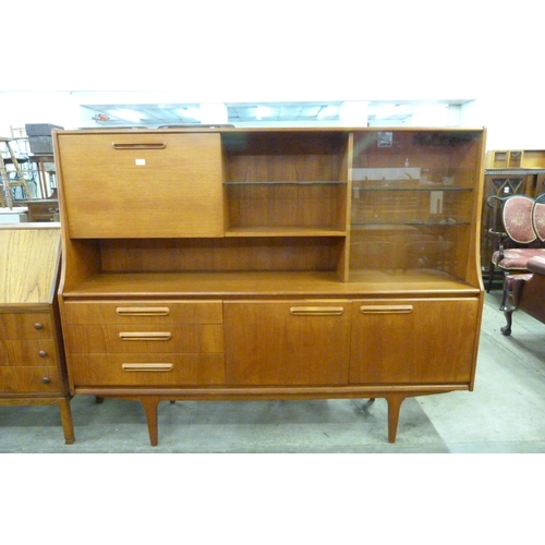 42 - A Jentique teak highboard