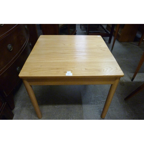 60 - An Ercol Blonde ash square coffee table