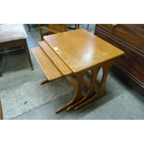 63 - A teak nest of tables