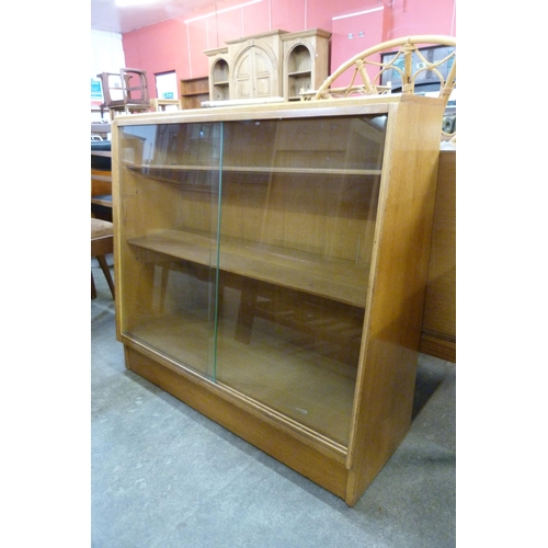 66 - A light oak bookcase