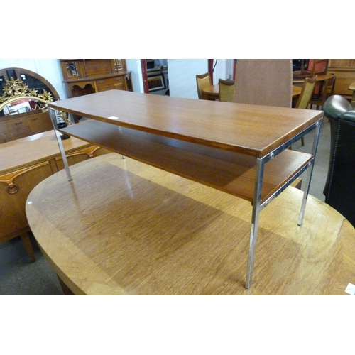 72 - A teak and chrome two tier rectangular coffee table and a standard lamp