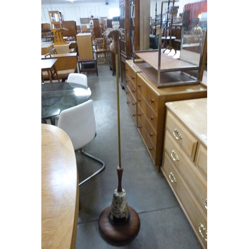 72 - A teak and chrome two tier rectangular coffee table and a standard lamp