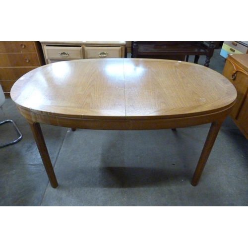 73 - A Nathan teak extending dining table