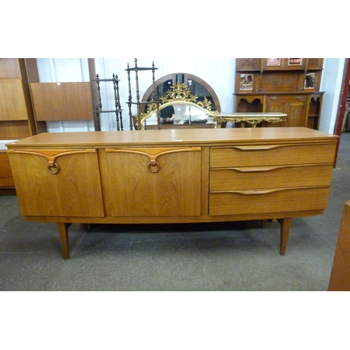 74 - A Beautility teak sideboard