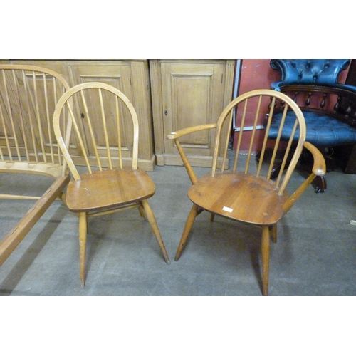 84 - Two Ercol Blonde elm and beech Windsor chairs