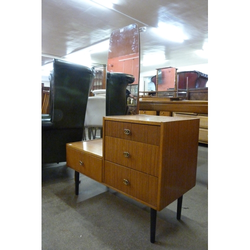 85 - A small teak dressing table