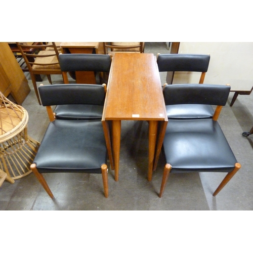 89 - A teak drop-leaf dining table and four chairs