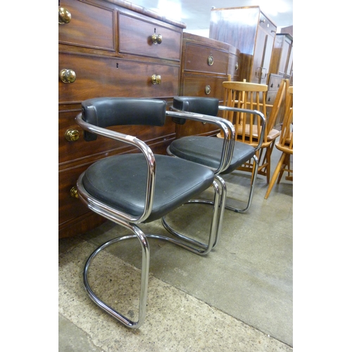 93A - A pair of Italian chrome and black vinyl cantilever armchairs