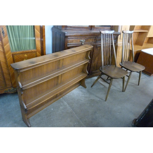 95 - A pair of Ercol Golden Dawn elm and beech Goldsmith chairs and a plate rack