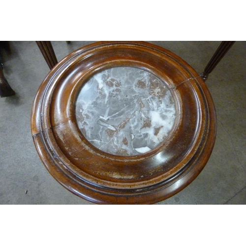 98 - A Victorian mahogany and marble topped cylindrical pot cupboard