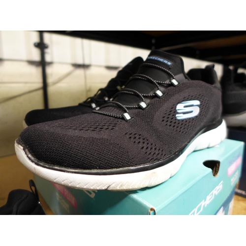 3128 - Pair of women's black Skechers trainers - UK size 7 * this lot is subject to VAT