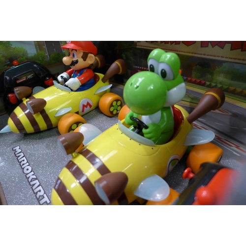 3273 - Mario Kart Twin Pack Mario & Yoshi Remote Control Cars (292-27 ) * This lot is subject to vat