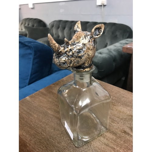 1362 - A glass storage bottle with rhino head stopper, H 24cms (HKL3506)   #