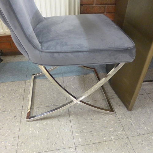 1301 - A grey ceramic top dining table with a set of six Hugo dark grey velvet dining chairs  *This lot is ... 