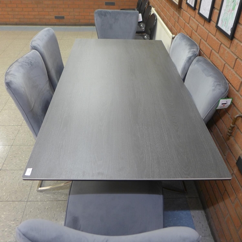 1301 - A grey ceramic top dining table with a set of six Hugo dark grey velvet dining chairs  *This lot is ... 