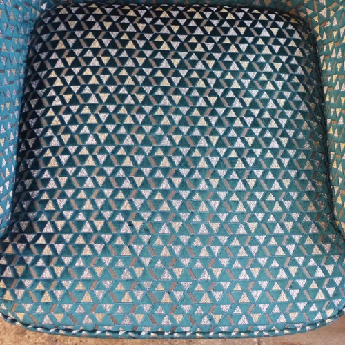 1426 - A teal geometric patterned side chair