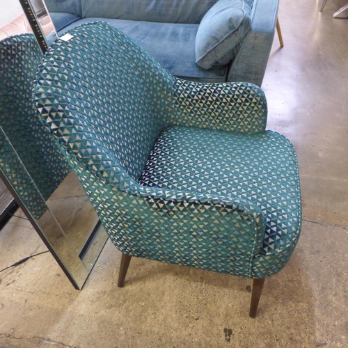 1426 - A teal geometric patterned side chair